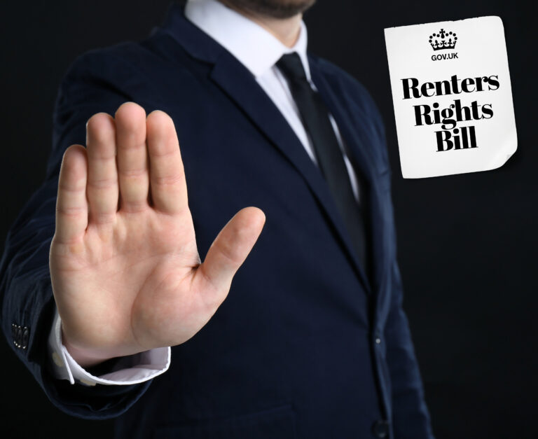 businessman putting hand up to reject the renters Righrs bill document