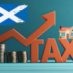 Tax word and arrow over coins with a scottish flag