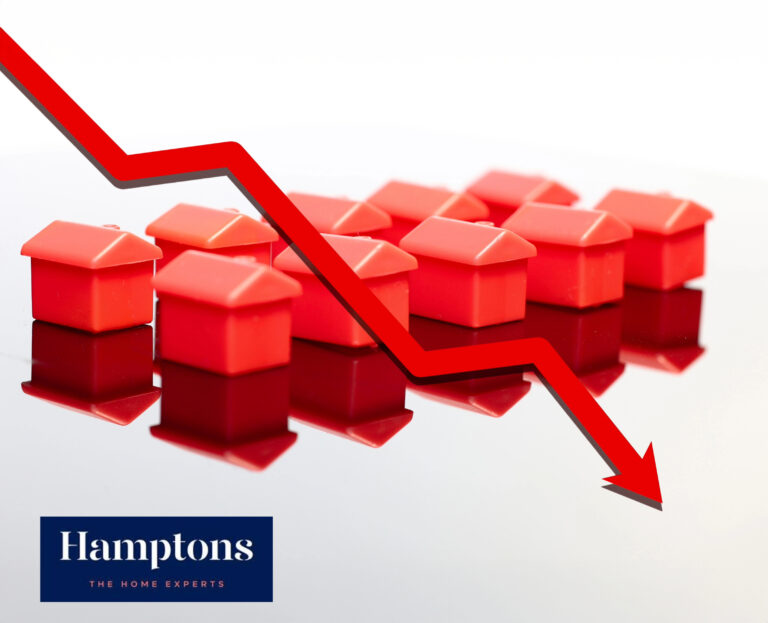 red small houses with red down arrow