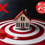 target with house in the middle and a dart not hitting the house and the labour logo