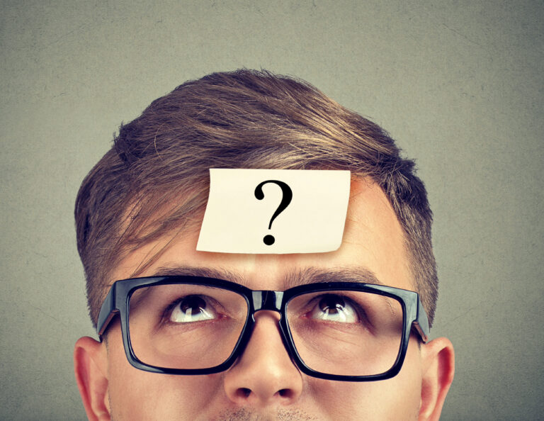 half man face with a question mark on his forehead