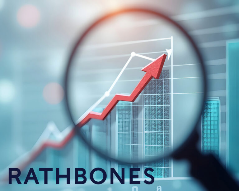 Magnifying glass on surging stock graph