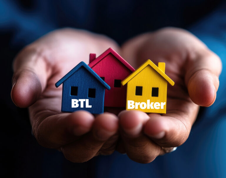 Hands holding miniature houses symbolising buy-to-let brokers and landlord property investment.