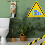 Bathroom with severe damp and mould on the wall highlighting poor housing standards.