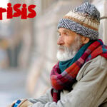 Elderly man in warm clothes sitting outdoors, highlighting homelessness among older renters.