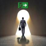 Businessperson walking toward a bright exit symbolizing landlords leaving the rental market