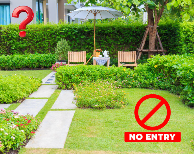 Disputed shared garden area with seating and “no entry” sign
