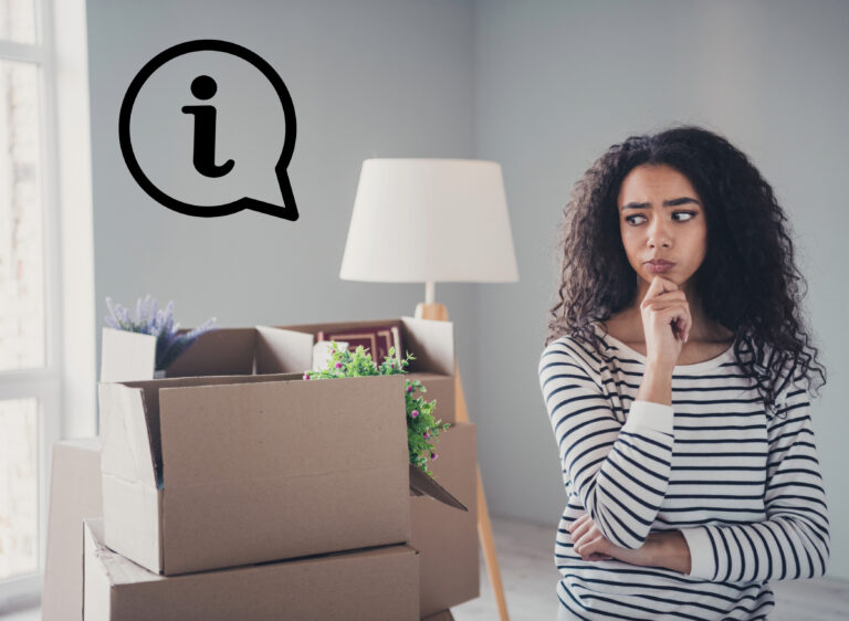 Student looking uncertain while surrounded by moving boxes, symbolizing confusion about renting at university
