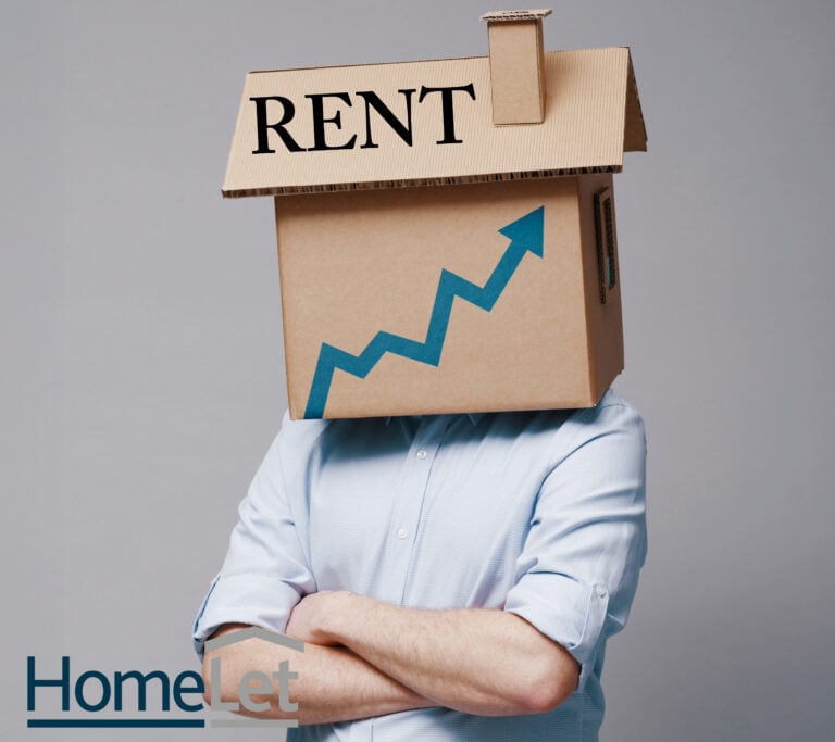 Cardboard house labeled “Rent” with rising arrow symbolizing increasing rental prices.