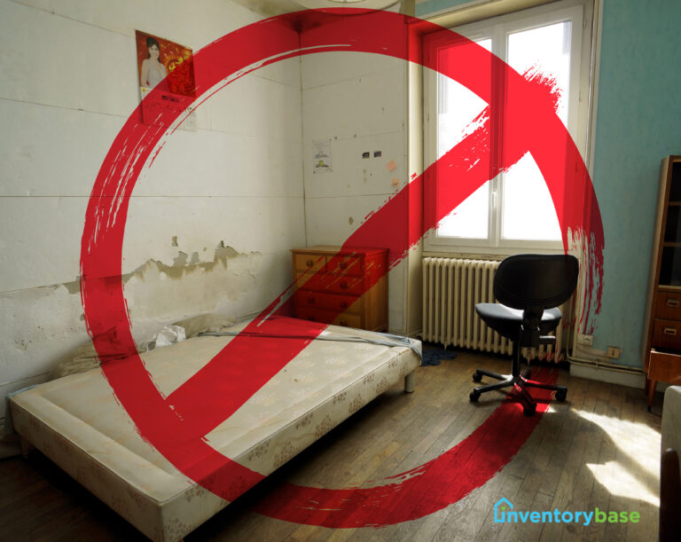 Unfit rental property with damp walls and broken furniture marked with a red prohibition sign