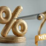 Golden percentage symbol being cut by scissors, symbolizing new mortgage rate reductions.