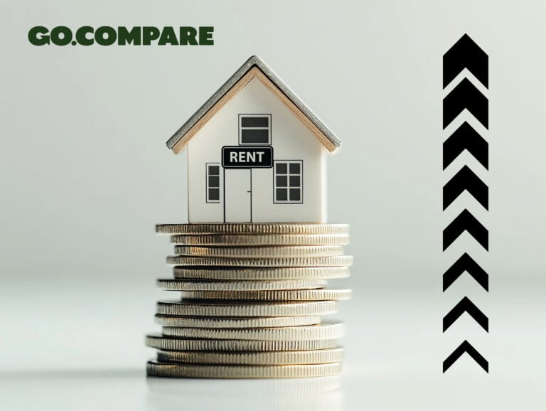 House model on stacked coins with rising rent arrows