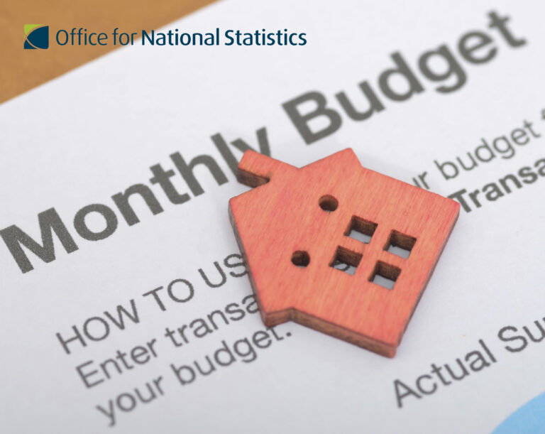 Wooden house icon on a document showing monthly budget figures from the Office for National Statistics.