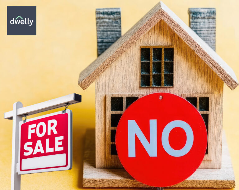 House with a “For Sale” sign and a red “NO” symbol representing drop in landlord property purchases.