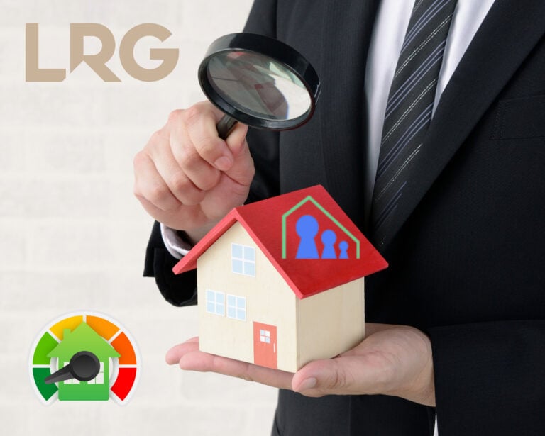 Landlord examining a model house with a magnifying glass, symbolizing property inspections and compliance checks.