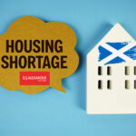 Concept image highlighting Scotland’s housing shortage with DJ Alexander logo and Scottish flag house