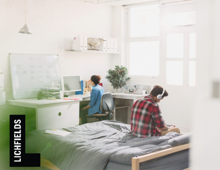 Students studying in a bright shared accommodation room in London