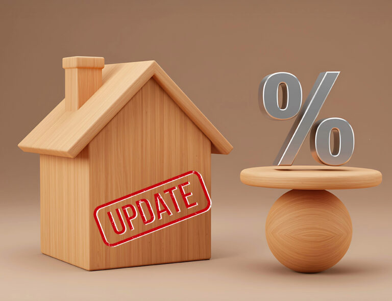 Wooden house with “Update” stamp beside percentage symbol representing mortgage rate changes.