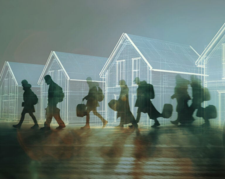 Asylum seekers walking past outlines of new-build houses, symbolising housing challenges in the UK