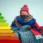 Person bundled in layers of clothing with energy efficiency scale beside them, highlighting fuel poverty.