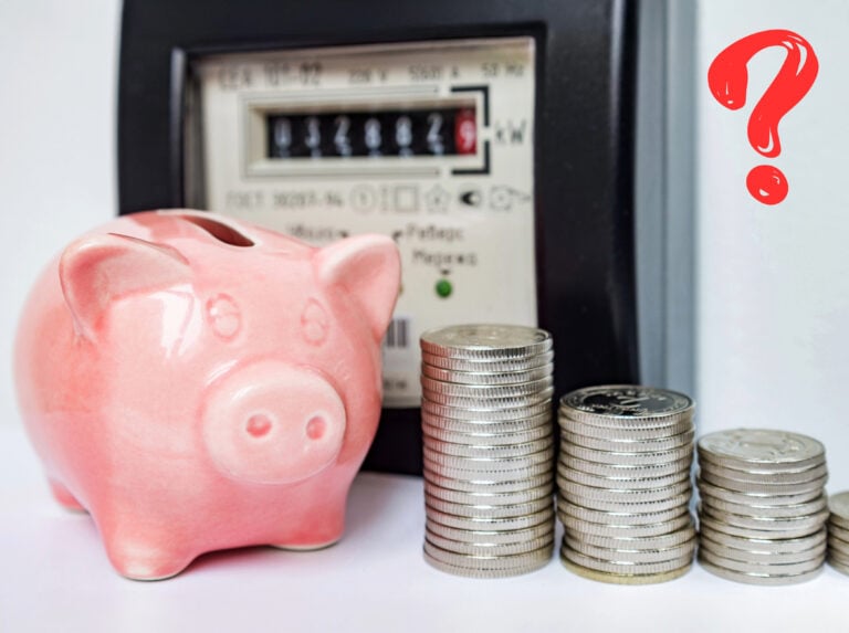 Piggy bank and coins beside electricity meter with question mark symbolizing rising energy costs.