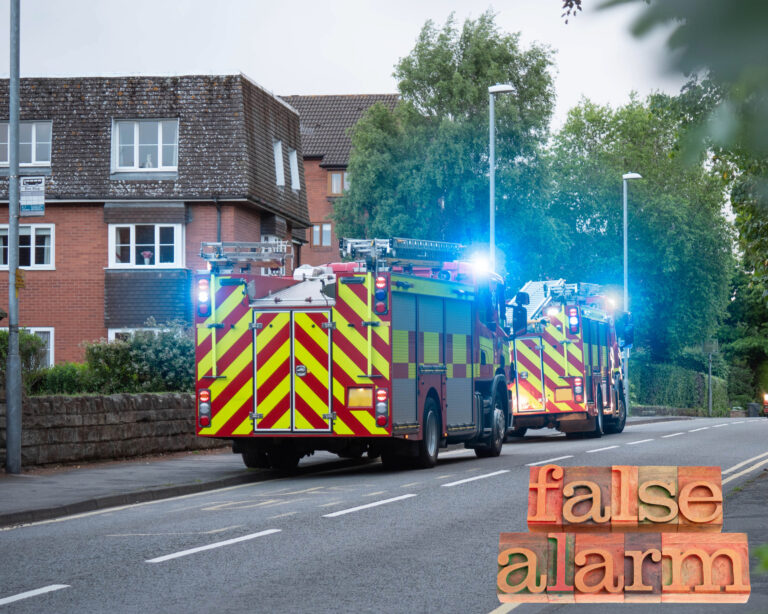 Fire engines respond to a false alarm at a block of flats in England