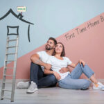Happy young couple planning their first home purchase with “First Time Home Buyers” text.