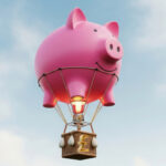 Pink piggy bank hot air balloon symbolizing rising rental income for UK landlords