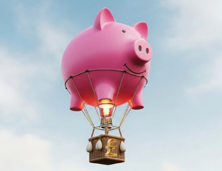 Pink piggy bank hot air balloon symbolizing rising rental income for UK landlords