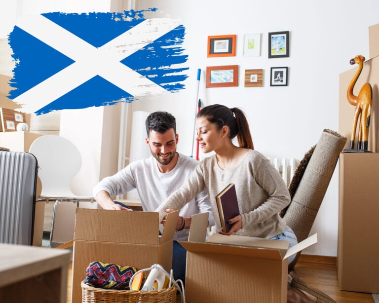 Couple unpacking boxes in new home with Scottish flag overlay