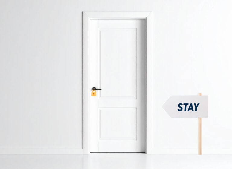 Locked white door with a stay sign symbolizing landlords remaining in the rental market