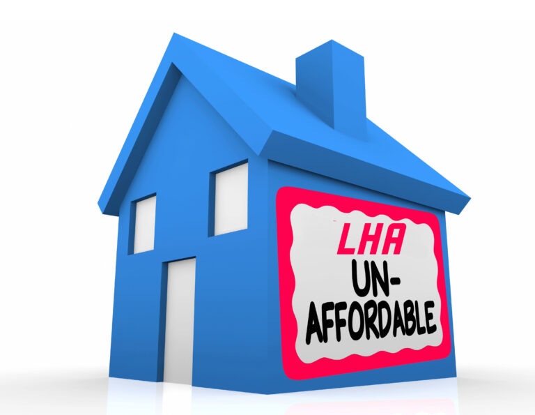 Blue house model with “LHA Unaffordable” sign highlighting the housing affordability crisis.