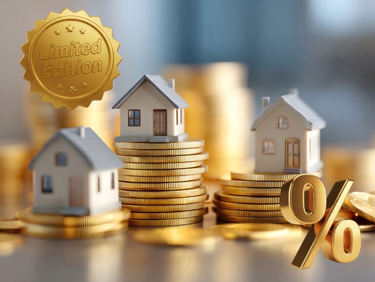 Miniature houses on gold coin stacks with limited edition mortgage badge and percentage symbol