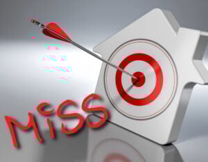 Arrow hitting target with the word “miss” symbolizing failure to meet housing goals