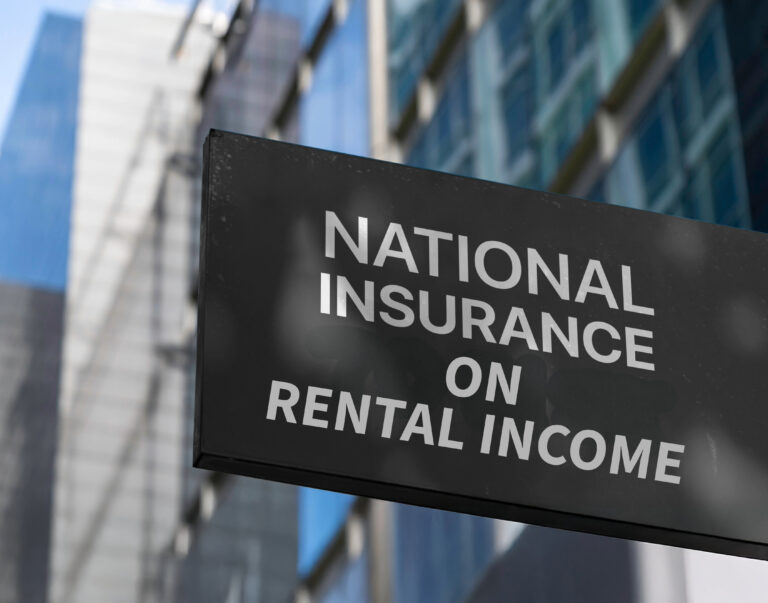 Sign showing “National Insurance on rental income” outside office buildings.