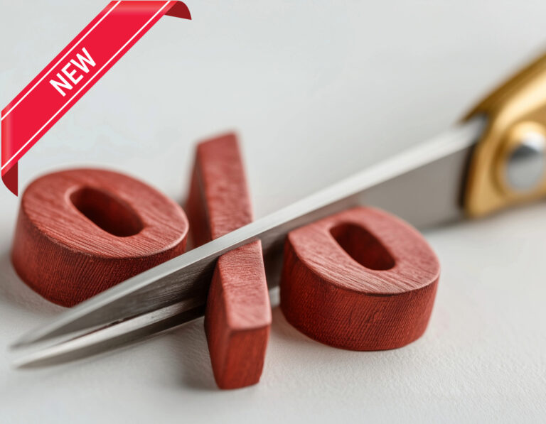 Scissors cutting a wooden percent sign symbolizing mortgage rate reductions.