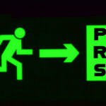 Green exit sign symbolising landlords leaving the private rented sector amid housing shortages