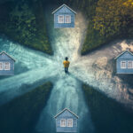 Person standing at a crossroads choosing between different housing paths.