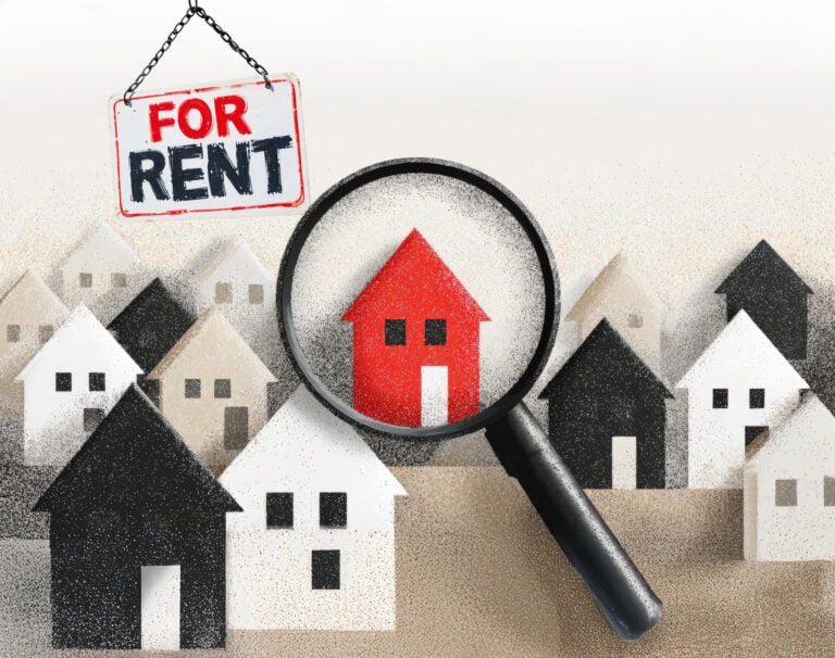 Magnifying glass highlighting a red house among others with a “For Rent” sign, symbolizing rental market trends.