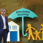 London Mayor Sadiq Khan with affordable housing graphic showing a house, umbrella, and family figures
