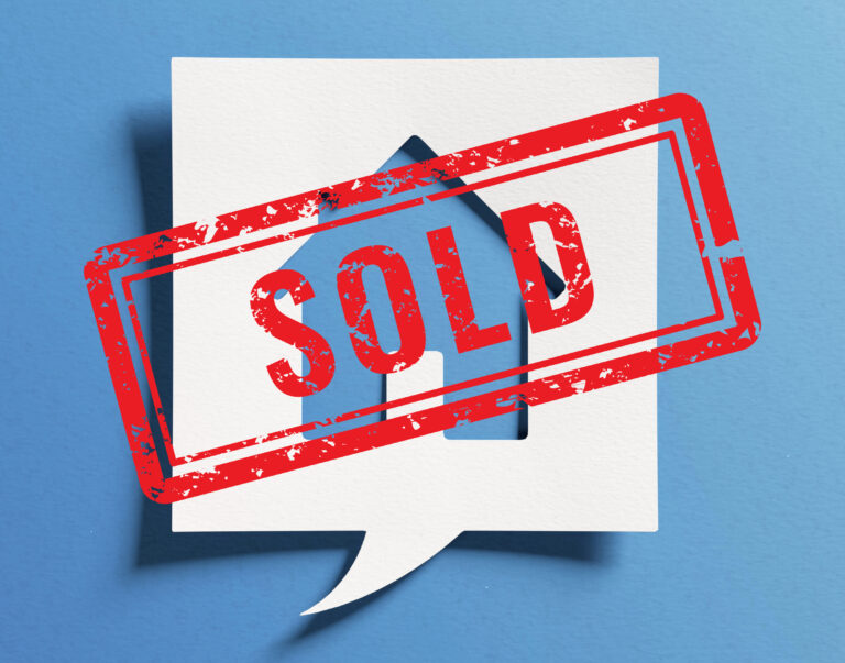 Sold sign over house icon representing landlords selling rental properties amid housing debate