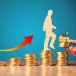 Man climbing coin stacks toward a house, symbolizing rising rental yields and property investment growth