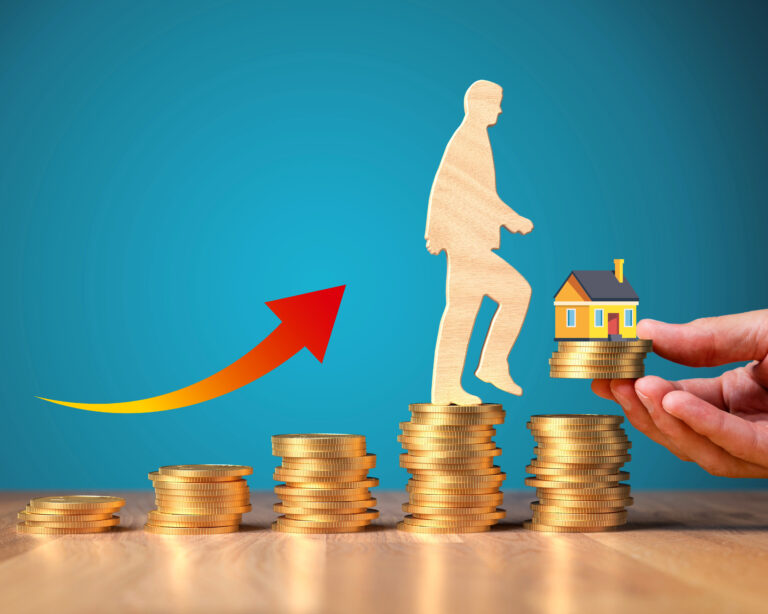 Man climbing coin stacks toward a house, symbolizing rising rental yields and property investment growth