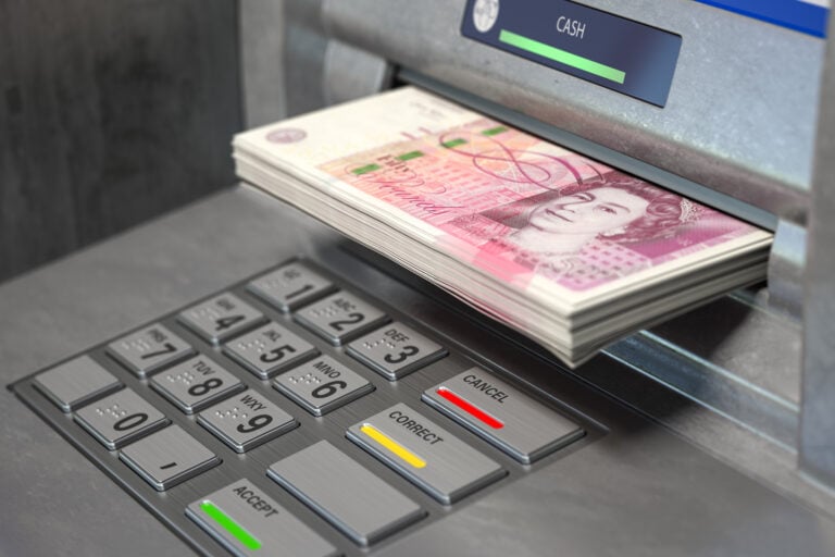 ATM dispensing cash symbolising high profit machines in property investment strategies