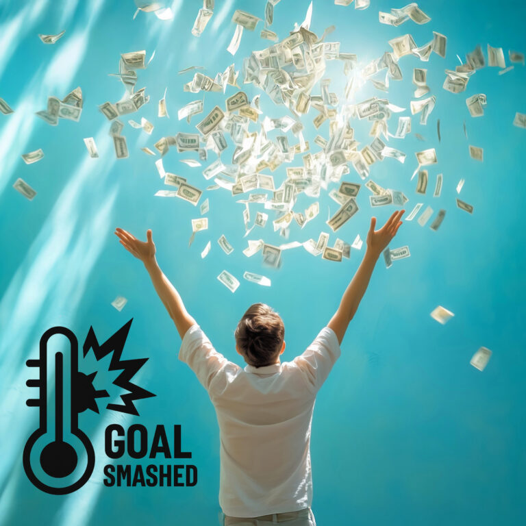 Person celebrating as money falls from above, symbolising a record-breaking charity fundraising achievement