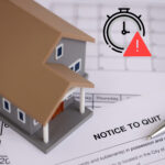 Eviction notice paperwork with a house model and warning symbol highlighting Section 21 deadline
