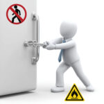 Figure securing a locked door with warning signs for restricted access and fire hazard