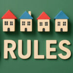 Wooden house icons with coloured roofs above the word “RULES” relating to new HMO regulations