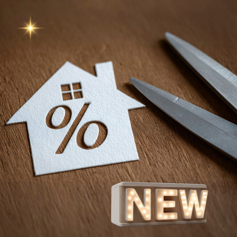 New mortgage rate changes symbolised by house cutout, percentage sign and scissors