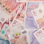 British pound banknotes representing rising landlord registration fees under the Renters’ Rights Act